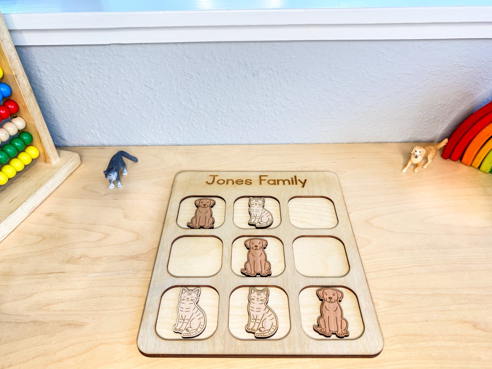 Cats and dogs tic tac toe set in a playroom