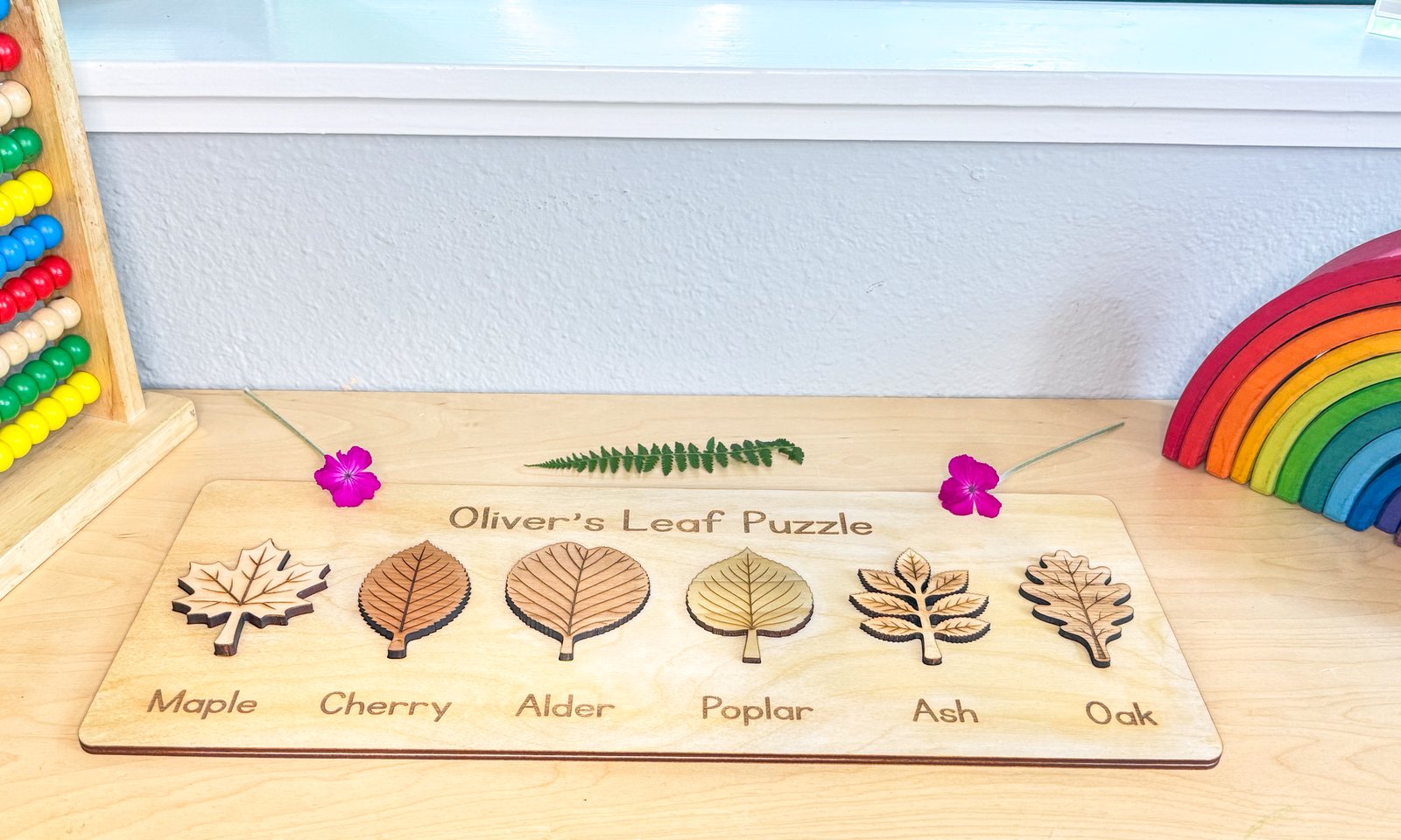 Leaf puzzle pieces laid out for a nature study activity