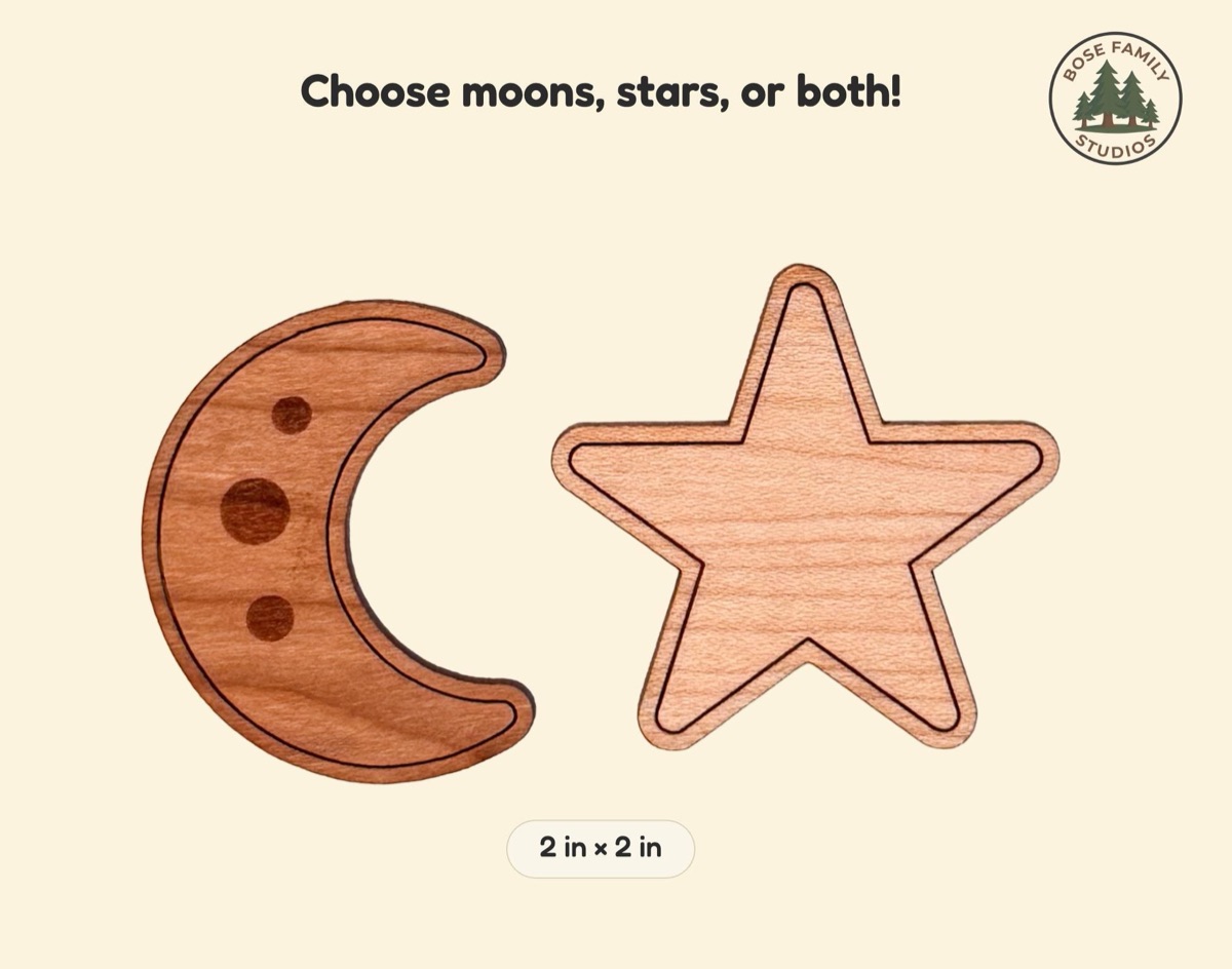 One cherry crescent moon engraved with three craters beside one maple five-pointed star with an engraved outline on a cream background, labeled 2 inches by 2 inches under the heading Choose moons, stars, or both